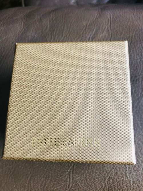 ESTEE LAUDER VINTAGE UNUSED LUCIDITY POWDER COMPACT IN THE ZODIAC LEO SIGN